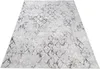 A rug with a diamond pattern, displayed from a diagonal angle on a white background. Produktbild-Vorschau