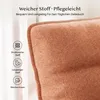 Close-up of a textured fabric cushion with overlaid text and icons highlighting product features. Produktbild-Vorschau