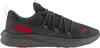A side view of a gray Puma sneaker with red accents. Produktbild-Vorschau