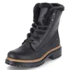 A black boot with fur lining on a white background. Voir les images du produit