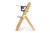 A side view of a wooden high chair with a green tray and seat, set against a white background. Náhľad obrázku produktu