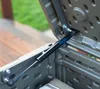 Close-up of a gas strut on a brown plastic storage box lid. Produktbild-Vorschau