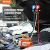 A person is working on a car engine with a vacuum pump and manifold gauge set. Produktbild-Vorschau