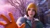 A young woman in a yellow beanie and orange gloves reaches out towards the camera in a snowy, wintery environment. Náhled obrázku produktu