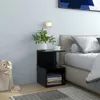 A bedroom scene with a nightstand next to a bed. Podgląd zdjęcia produktu