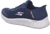 A side view of a blue Skechers slip-on sneaker with a white sole. Anteprima dell’immagine prodotto