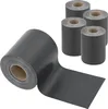 A large roll of dark gray privacy screen material is in the foreground, with four smaller rolls stacked behind it. Anteprima dell’immagine prodotto