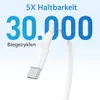A close-up of a white USB-C cable connector with text highlighting its durability. Produktbild-Vorschau