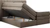 A boxspring bed with its storage compartment open, revealing the internal mechanism and storage space. Produktbild-Vorschau