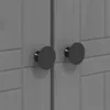A close-up view of two black circular knobs on a gray wooden cabinet. Voir les images du produit