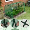 A mini greenhouse with plants inside, shown next to a brick wall and a wooden barrel. The image also includes close-up shots of the greenhouse's features. Podgląd zdjęcia produktu