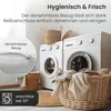 A laundry room scene with washing machines and laundry baskets. Produktbild-Vorschau