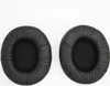Two black headphone ear pads are shown against a white background. Anteprima dell’immagine prodotto