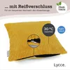 A yellow corduroy cushion with a visible zipper, highlighted with text and icons indicating features. Produktbild-Vorschau
