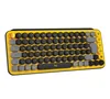 A yellow and black Logitech POP Keys mechanical Bluetooth keyboard with round keys is shown from a slightly elevated side angle against a white background. Produktbild-Vorschau