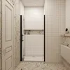 A modern bathroom with a shower enclosure. Produktbild-Vorschau