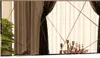 A rectangular mirror with an asymmetric grid pattern is shown, reflecting a room with curtains and decorative items.