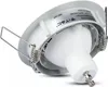 A white GU10 LED spotlight fitting with spring clips, viewed from a low angle. Voir les images du produit
