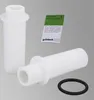 Two white filter cartridges and a black O-ring are displayed against a light gray background, along with a small green and white informational tag. Anteprima dell’immagine prodotto
