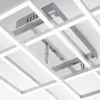A close-up view of a modern LED ceiling light fixture with a geometric design. Anteprima dell’immagine prodotto