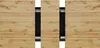 A top-down view of an extendable dining table with a wood-grain finish and black accents. Náhled obrázku produktu