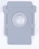 A close-up, top-down view of a gray dust bag for a robot vacuum cleaner. Produktbild-Vorschau