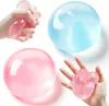 Lot de 2 balles anti-stress « squishy » bleues et roses – à Voir les images du produit 1