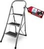 A three-step stepladder with a red tag attached to the handle. Produktbild-Vorschau
