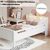 A child's bedroom with a white wooden bed, a desk, and decorative elements. Produktbild-Vorschau
