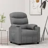 A grey fabric recliner chair is shown in a room with a side table and a floor lamp. Voir les images du produit