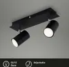 A black ceiling spotlight with two adjustable heads is shown against a plain gray background. Produktbild-Vorschau