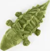 A plush toy alligator is shown from a top-down perspective against a white background. Podgląd zdjęcia produktu