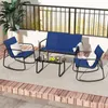 A patio furniture set on a wooden deck with a railing in the background. Anteprima dell’immagine prodotto