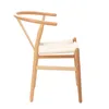 A side view of a natural wood chair with a woven seat. Podgląd zdjęcia produktu