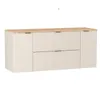 A white and wood vanity cabinet with fluted fronts and metal handles. Podgląd zdjęcia produktu