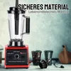 A red and black blender is shown on a counter with some kitchen items in the background. Produktbild-Vorschau