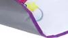 Close-up view of the edge of a play mat, showing the fabric backing and the purple binding. Produktbild-Vorschau
