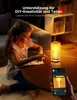 A young girl is drawing at a table with a colorful LED lamp and a smartphone displaying a pixel art flower. Produktbild-Vorschau
