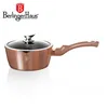 A rose gold saucepan with a glass lid, shown from a side angle on a white background, with the brand logo and name at the top left. Náhled obrázku produktu
