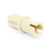 A single beige LEGO Technic pin with an axle, isolated on a white background. Produktbild-Vorschau