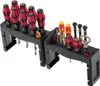 A set of screwdrivers and other tools arranged in black plastic holders. Podgląd zdjęcia produktu