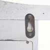A close-up view of a metal hanging bracket attached to a white wooden surface. Náhľad obrázku produktu