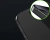 A close-up view of the corner of a black smartphone, highlighting its edge and screen protector. Anteprima dell’immagine prodotto