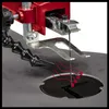 A close-up view of a scroll saw's blade and cutting area, with red arrows indicating airflow. Produktbild-Vorschau