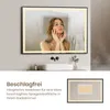 A woman is looking into a bathroom mirror that has condensation on it, except for a clear area. The mirror is illuminated by LED lights around the frame. Below the mirror is a sink and faucet. A smaller inset image shows the back of a similar mirror with a Anteprima dell’immagine prodotto