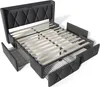 A dark gray upholstered bed frame with a tufted headboard and four storage drawers is shown from a slightly elevated, diagonal angle. Podgląd zdjęcia produktu