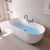 A white freestanding bathtub filled with blue water, featuring black fixtures, in a modern bathroom setting. Náhled obrázku produktu