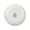 The underside of a white ceramic plate with text and a logo printed on it. Náhľad obrázku produktu