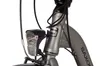 Close-up of the front of a bicycle, focusing on the handlebars and front light. Produktbild-Vorschau