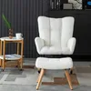 A white fluffy armchair and ottoman set is shown in a living room setting. Podgląd zdjęcia produktu
